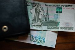 Курс рубля вырос до максимума за год